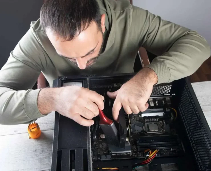 maintenance-cleaning-insides-computer-scaled