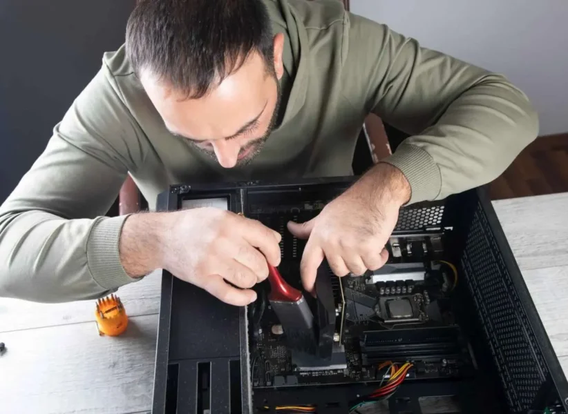 maintenance-cleaning-insides-computer-scaled